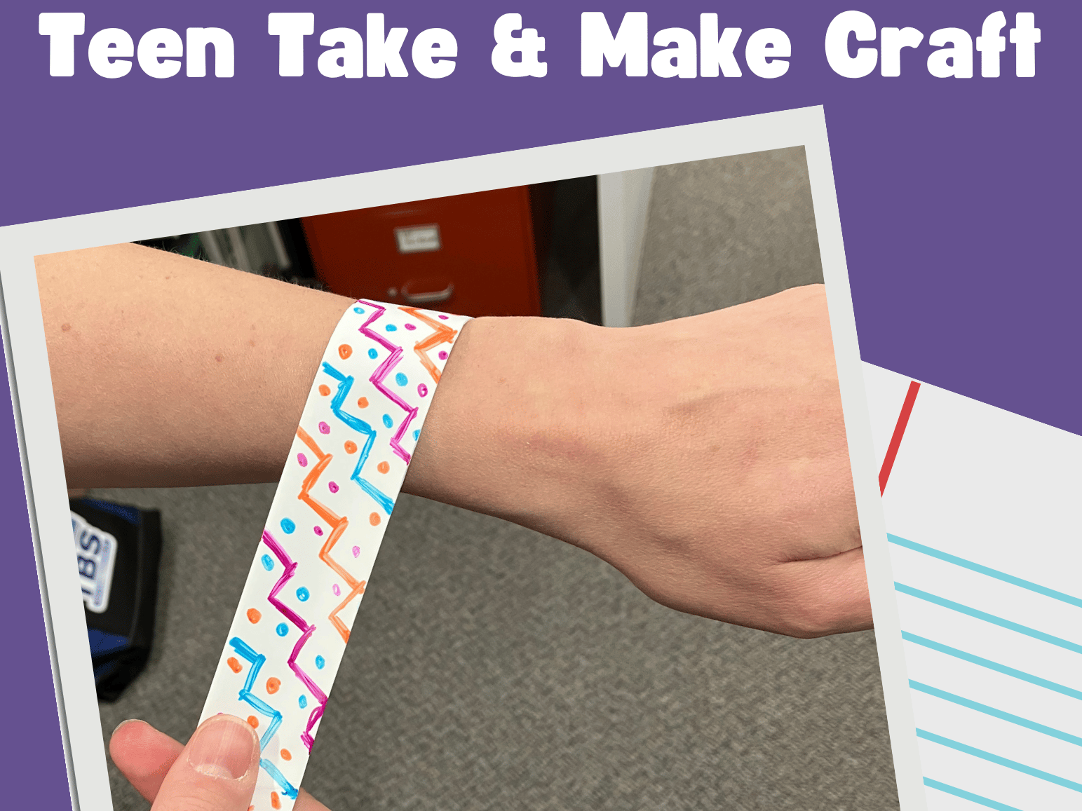 A person's wrist with a homemade decorated slapwrist bracelet with the words Teen Take and Make Craft on the top in white